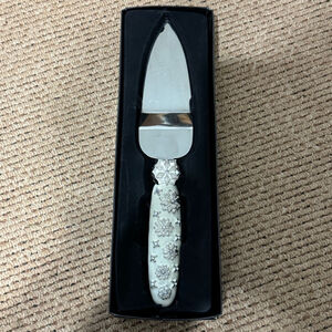 2 Saints Cake Knife Slicer Snowflake Flower Embellished Handle 10.75” X 2”